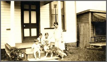 Emma (Vickers) Taylor, Harry Frank George and Dog at Campbell Ave Ontario about 1927